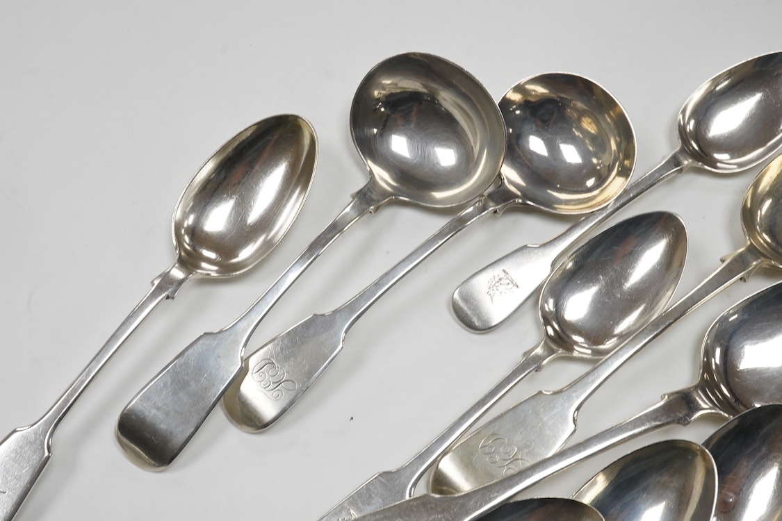 A matched part canteen of 19th century silver fiddle pattern flatware, various dates and makers, including a set of four George III table forks, Eley & Fearn, London, 1807, 28oz, and one plated table spoon.
